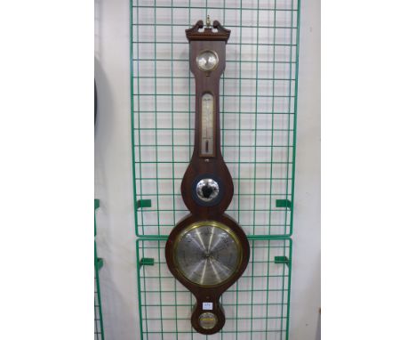 A mahogany barometer/thermometer