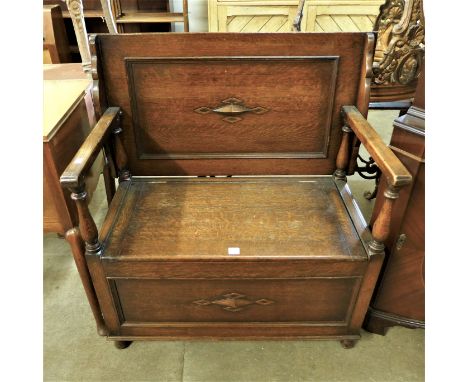 An oak monks bench