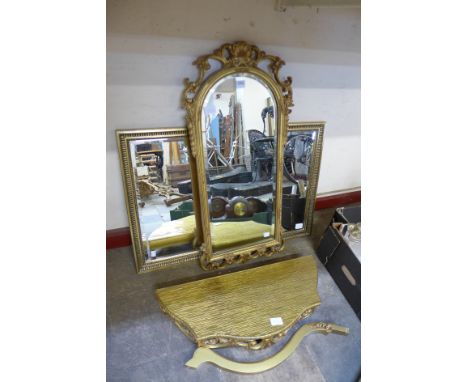 A small gilt console table and mirror and another gilt mirror