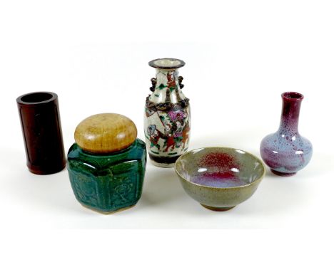A group of five Chinese ceramic items, comprising a bottle vase, 15cm high, and bowl, 7cm high, decorated with red, pale blue