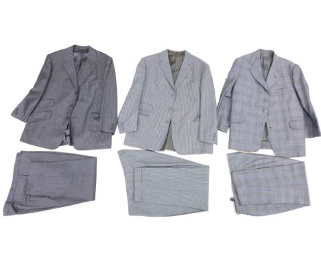 Three tailored suits, comprising a light grey pin stripe, a blue and grey checkered, together with a dark grey pinstripe, two