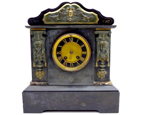 A Victorian slate mantle clock, with Roman numeral dial, eight day movement, ormolu mounts, 30.5 by 15 by 35cm high. 