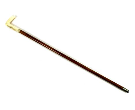 A Victorian malacca walking stick, with carved ivory handle, with shield engraved 'G. P.', brass cap to end, 8.5 by 1.8 by 84