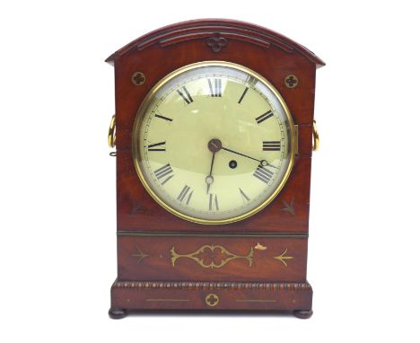 An early 19th century walnut mantel clock, with Roman numeral dial, single fusee eight day movement, brass handles to each si