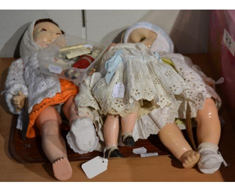 Bisque socket head doll with fixed brown eyes and blond wig, composition jointed body (af), two Roddy plastic dolls, miniatur