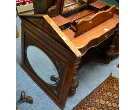 A late Victorian carved walnut mirror and a shelf  