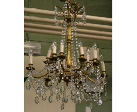 Gilt metal and cut glass twelve-light chandelier 