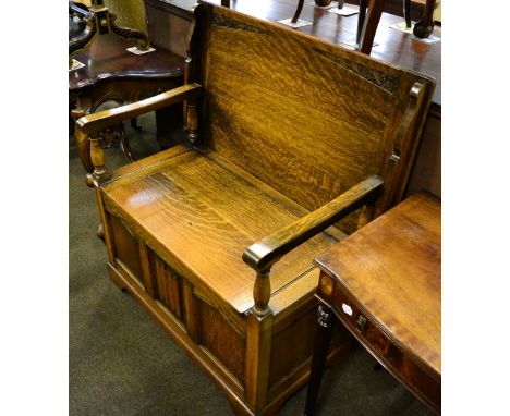 A 20th century oak monks bench 