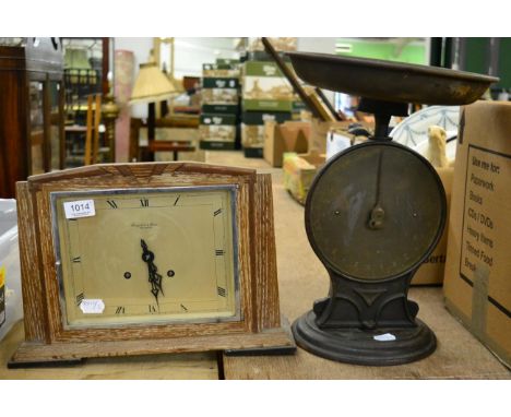 An Art Deco oak mantel clock signed Croydon & Sons, Ipswich; and a large set of Salters Improved family scales 