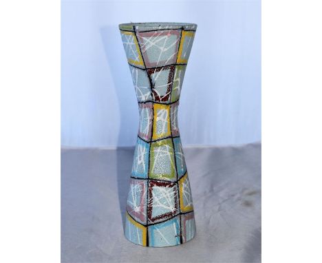A vintage 1960's multicoloured ceramic vase with pale blue background H 30cm x W 10cm 