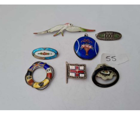 A quantity of assorted silver and enamel brooches pendants etc. some af