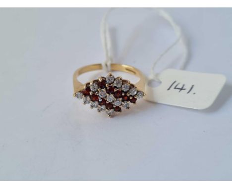 A attractive red and white multi stone ring 9ct size o -  3.1 gms 