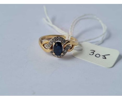 A sapphire and diamond ring 9ct size M - 2.3 gms 