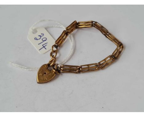 A rolled gold vintage gate bracelet