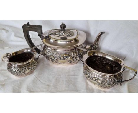 A 3 piece tea set with embossed decoration 