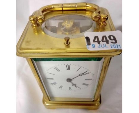 A brass striking/repeat carriage clock with fitted case.
