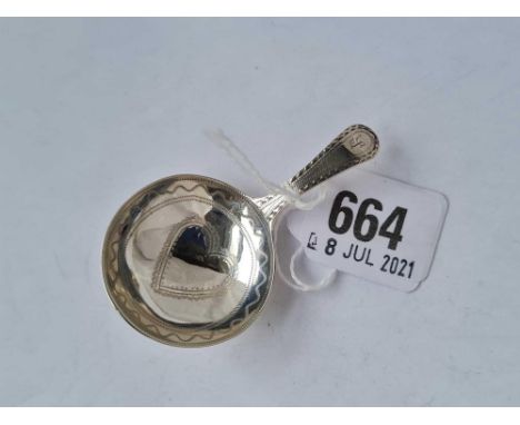 A Georgian bright cut caddy spoon, the bowl engraved with a heart - maker's mark only GB