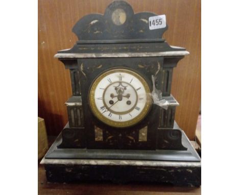 A Victorian marble cased mantel clock.