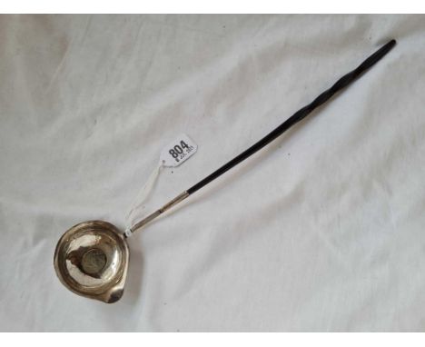 A Georgian toddy ladle inset with a George II sixpence 