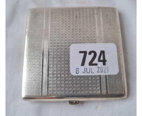 A square compact with fitted interior 