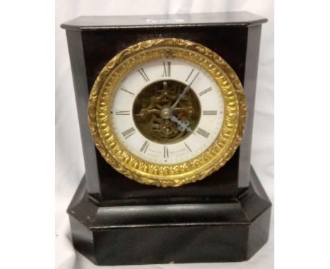 A Victorian Mantle clock from M MOSES, OXFORD ST, with chased bezel.