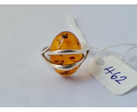 A silver and amber ring size M 