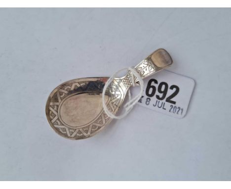A George III bright cut engraved caddy spoon with pear shaped bowl - Birmingham 1811 by C &amp; B
