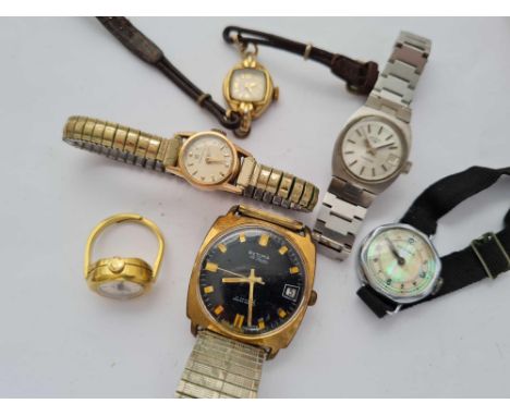 A gents black faced wrist watch by Rytima with seconds sweep together with a ladies omega and other ladies watches 