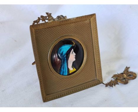 A 19th Century Limoges style enamel miniature of young lady in gilt metal mount - 3.5" wide 