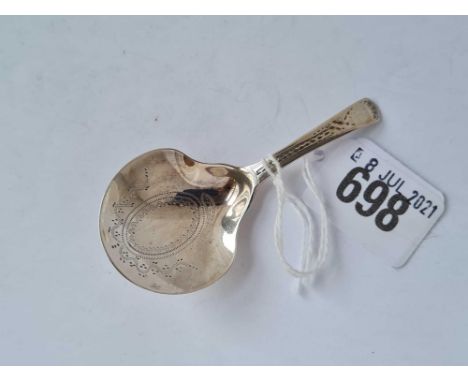 A bright cut caddy spoon with showel shaped bowl - London 1795 by TW 