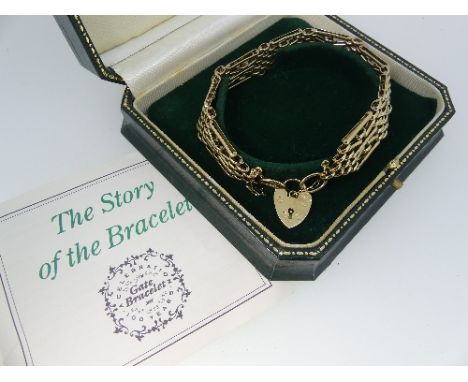 A 9ct yellow gold gatelink Bracelet, with 9ct gold padlock clasp, 22.8g, in fitted presentation case with leaflet 'The story 