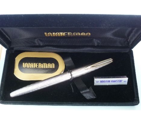 A French silver Waterman Fountain Pen, marked Argent Massif, with engine turned decoration and 18K (750) nib, in presentation