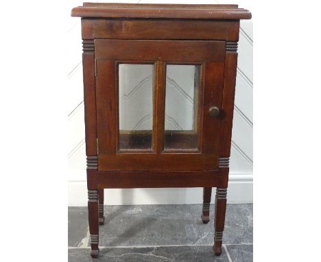 A small Edwardian mahogany Glazed Cabinet, with glazed panel doors, enclosing vacant interior, on square tapering legs and sp