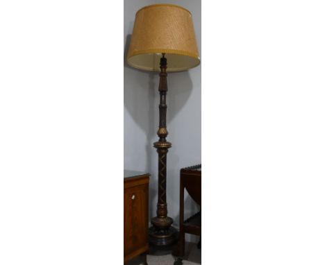A 1920s stained wooden Standard Lamp, with gilded features, 74in (188cm) high