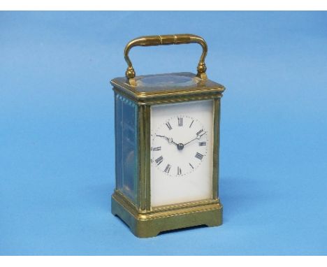 An early 20th century French gilt-brass striking Carriage Clock, of five-glass form with carry handle, 8-day twin-barrel move