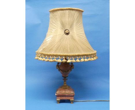 An 18thC style pink marble Lamp, the pink marble lamp base with gilt metal foliate swag decoration on set, with Rams heads ei