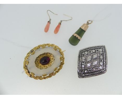 A late Victorian chalcedony and amethyst Brooch, in an unmarked foliate gold mount, tested, together with a gold mounted jade