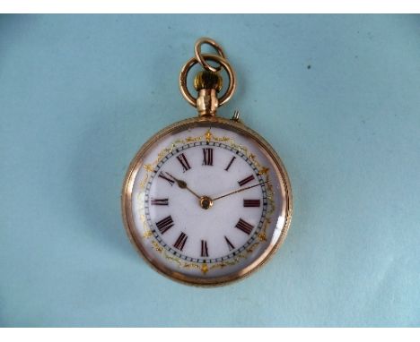 A pretty continental 9ct gold lady's Pocket / Fob Watch, with foliate engraved decoration and vacant cartouche, the white ena