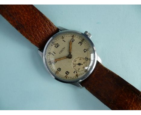 A W.W.II British Army issue Unitas 'Bravingtons' ATP (Army Trade Pattern) Wristwatch, with signed 15 jewel movement, the dial
