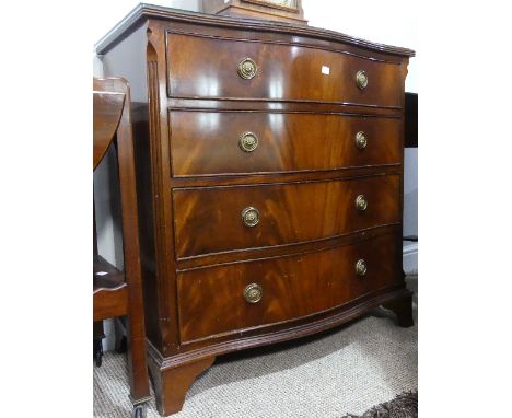 An antique-style serpentine-fronted Chest of Drawers, the glass topper upon inlaid top, on four long drawers of varying sizes