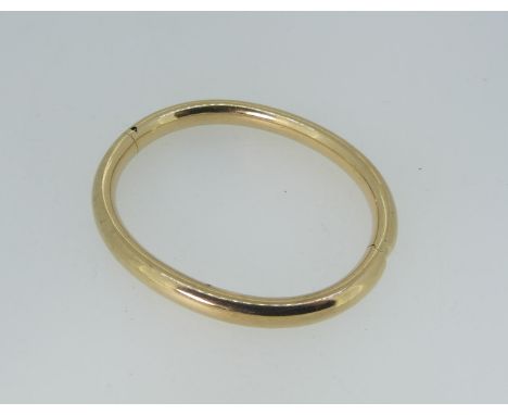 A 9ct gold hollow Hinged Bangle, approx weight 20g. 