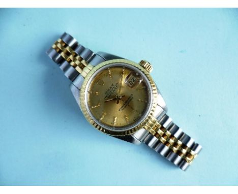 A lady's Rolex Oyster Perpetual Datejust superlative chronometer officially certified bi-metal Wristwatch, with signed gilded