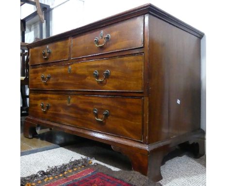 A Victorian mahogany low Chest of Drawers, formerly the lower part of a linen press, the two short on two long, with brass fi