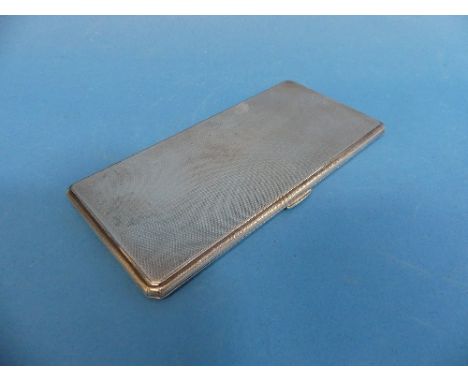 An Edward VIII silver Cigarette Case, hallmarked Birmingham 1936, of rectangular form with canted corners, engine turned deco