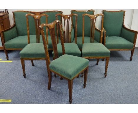 An Edwardian seven-piece Parlour Suite, comprising a mahogany-framed two-seater Sofa, with a pair of Armchairs and four Parlo