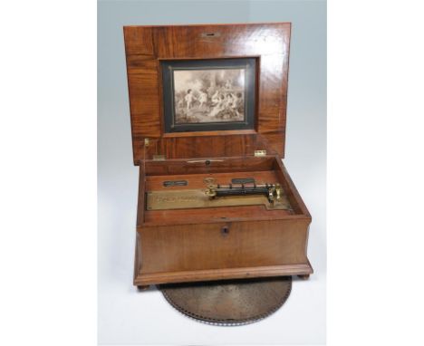 A Victorian bur walnut and marquetry inlaid polyphon circa 1880 playing 39.5cm discs, the gilt metal bed stamped polyphon No: