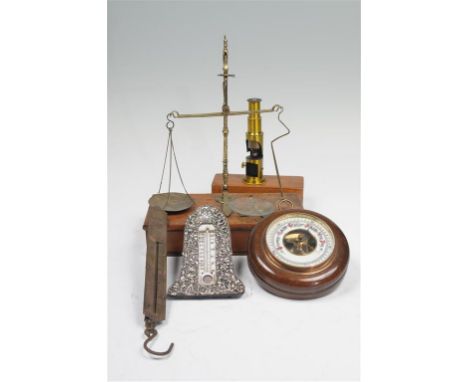 A wall barometer, 20th century with a white dial the reserve stamped JC, hardwood frame and an easel thermometer within an or