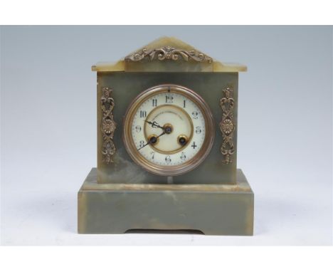 A Victorian green onyx and gilt metal mantel clock with a white dial with Roman numerals signed the Sheffield Goldsmith's Com
