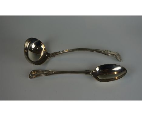 A Edward VII hallmarked silver ladle and basting spoon, each decorated in the Kings pattern, made by C. W Fletcher & Son Ltd 