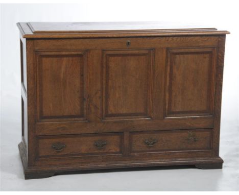 An oak and mahogany crossbanded mule chest in the 18th century style, the rectangular hinged and panelled top above three rai